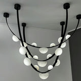 Dew Drops Alabaster Curated Alabaster Chandelier – side angled contour profile