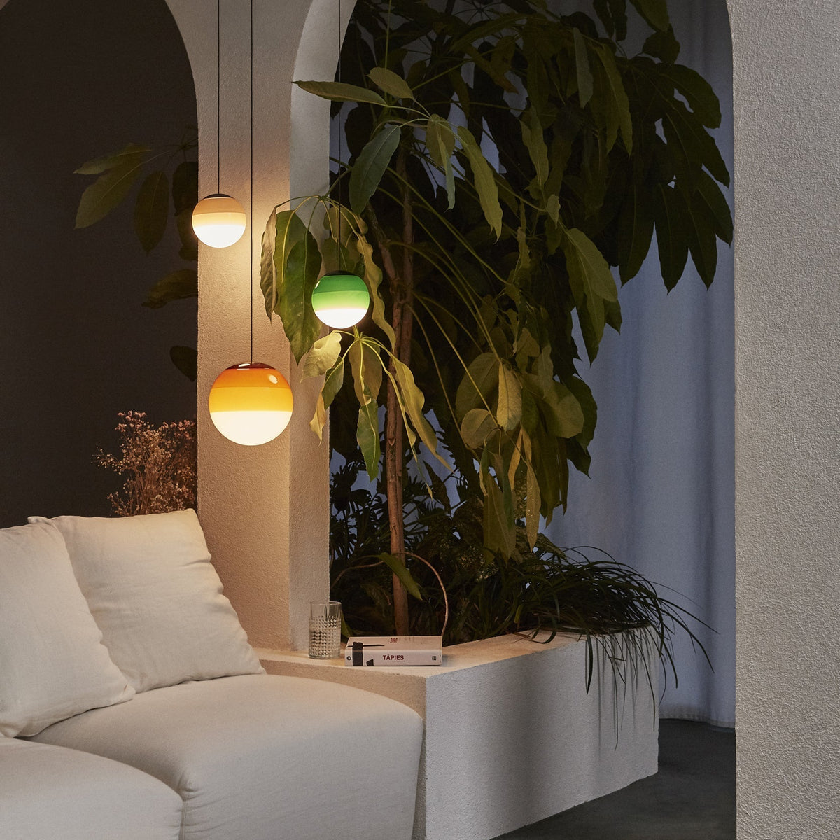 Dipping Curated Mouth-Blown Frosted Glass Chande – spatial dining room perspective