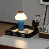 Whitby Curated Iron & Glass Table Lamp – illuminated warm ambiance setting