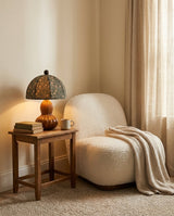 Calabren Curated Iron & Glass Table Lamp warm illuminated room view