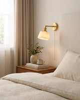 Cavella Alabaster Curated Alabaster Wall Sconce installed in residential dining space