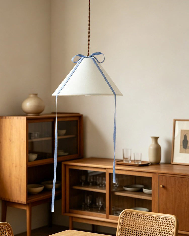 Cavelle Curated Finished Iron Pendant Light installed in residential dining space