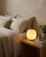 Citrava Curated Mouth-Blown Frosted Glass Table – illuminated warm ambiance setting