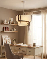 Cresswell Curated Finished Iron Pendant Light – illuminated warm ambiance setting