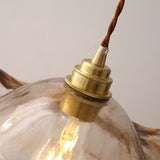 Cymara Curated Amber Art Glass Pendant Light – unlit natural material contrast