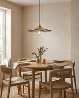 Cymara Curated Amber Art Glass Pendant Light warm illuminated room view