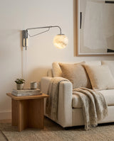 Dione  Alabaster Curated Alabaster Wall Sconce – handcrafted surface texture