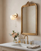 Eala Alabaster Curated Alabaster Wall Sconce installed in residential dining space