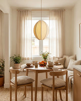 Elvara Curated Iron & Glass Pendant Light installed in residential dining space