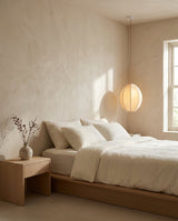 Elvara Curated Iron & Glass Pendant Light warm illuminated room view