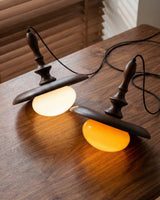 Elwood Curated Mouth-Blown Frosted Glass Pendant warm illuminated room view