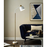 Emmental Curated Solid Brass Floor Lamp – illuminated warm ambiance setting