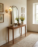Floravia Curated Hand-Thrown Ceramic Wall Sconce installed in residential dining space
