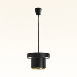 Kivaro Curated Iron & Glass Pendant Light – illuminated warm ambiance setting #1