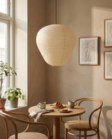 Kiyora Curated Washi Paper Pendant Light warm illuminated room view