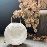 Woven Rattan craftsmanship detail on Kumo Curated Woven Rattan Table Lamp