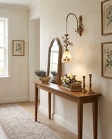 Maristelle Curated Solid Brass Wall Sconce installed in residential dining space