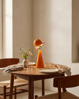 Mireva Curated Hand-Thrown Ceramic Table Lamp warm illuminated room view