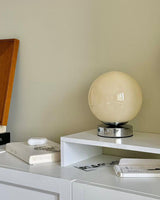 Modern Orlune Table Lamp – Ambient Illumination in Luxury Interior Setting View 7
