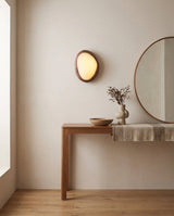 Ovela Curated Alabaster Wall Sconce warm illuminated room view