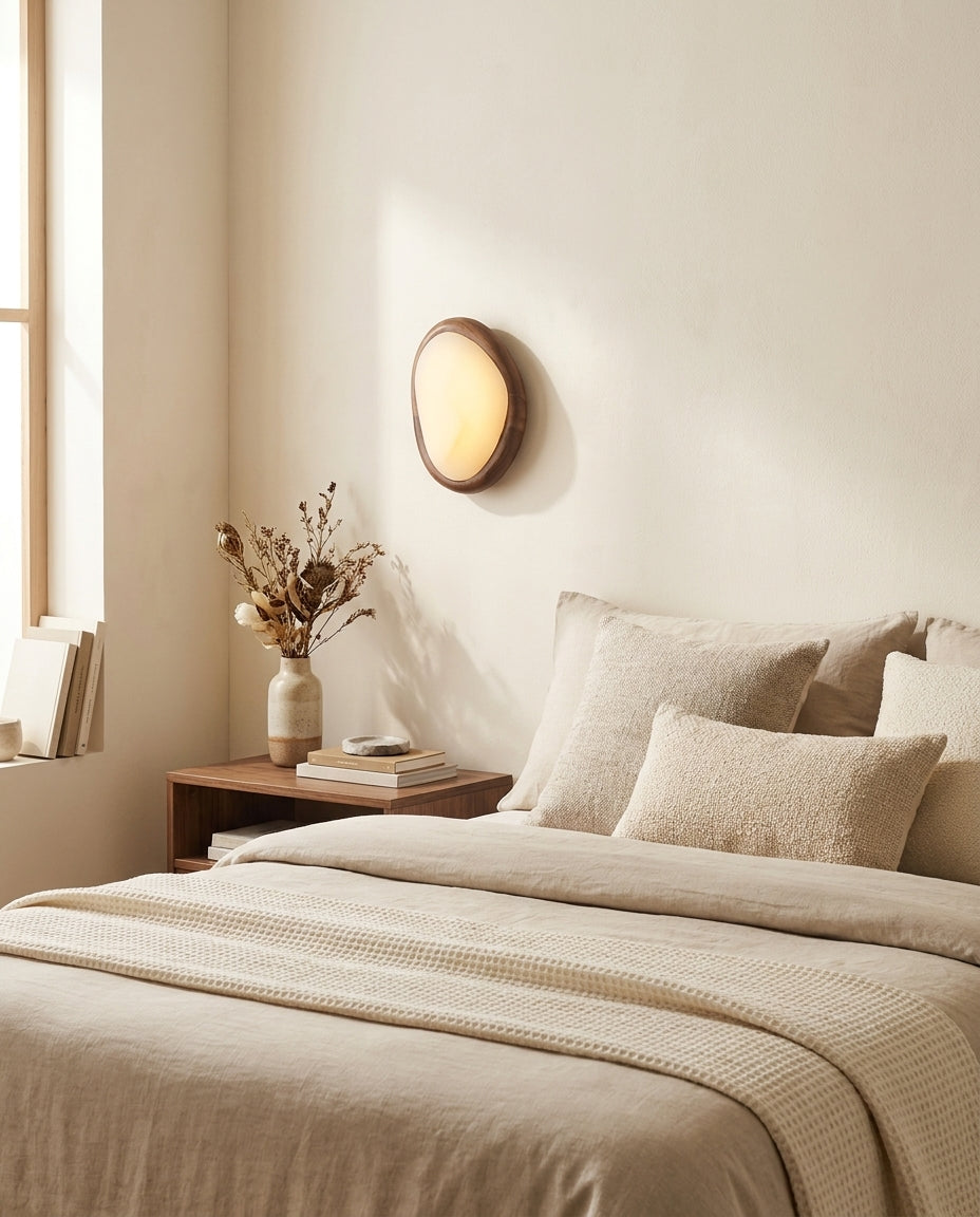 Ovela Curated Alabaster Wall Sconce – illuminated warm ambiance setting