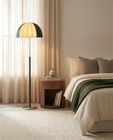 Parasolyn Floor Curated Solid Brass Floor Lamp warm illuminated room view