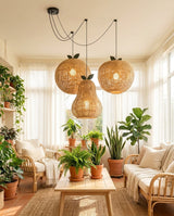 Pomarien Curated Woven Rattan Pendant Light – spatial dining room perspective