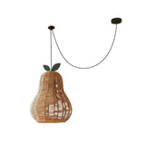 Pomarien Curated Woven Rattan Pendant Light – illuminated warm ambiance setting #1