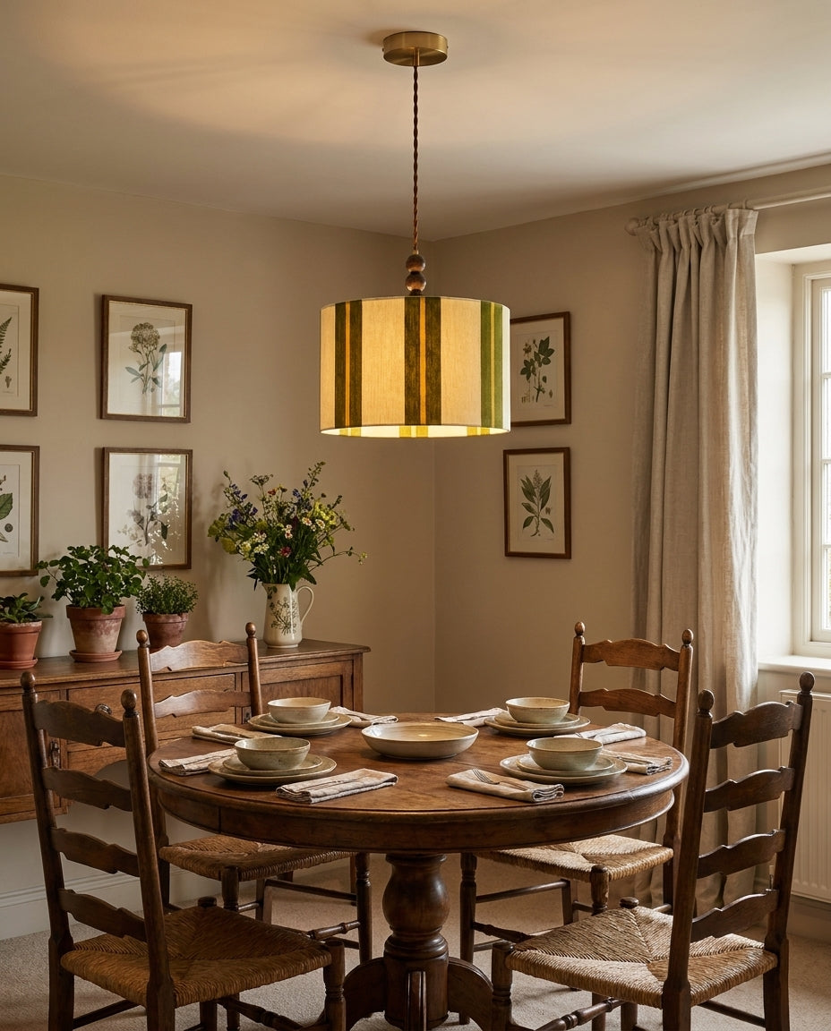 Pomeline Curated Solid Brass Pendant Light warm illuminated room view
