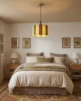 Pomeline Curated Solid Brass Pendant Light – illuminated warm ambiance setting