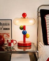Ravelin Curated Mouth-Blown Frosted Glass Table warm illuminated room view