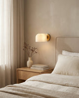Rillora Curated Mouth-Blown Frosted Glass Wall S – illuminated warm ambiance setting