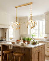 Rosavelle Curated Mouth-Blown Frosted Glass Pend warm illuminated room view