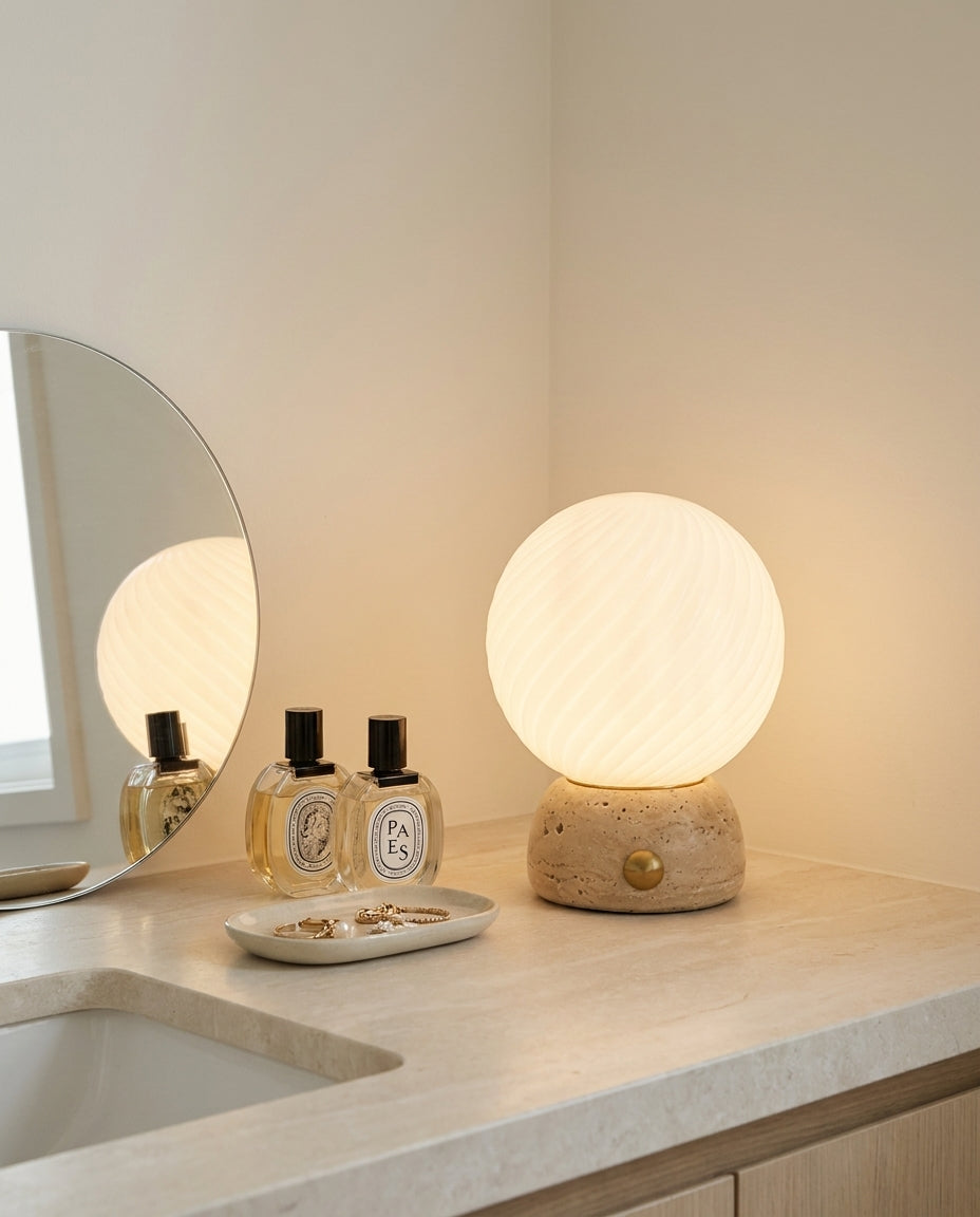 Savio Curated Yellow Travertine Table Lamp – illuminated warm ambiance setting