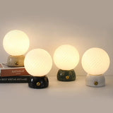 Savio Curated Yellow Travertine Table Lamp installed in residential dining space