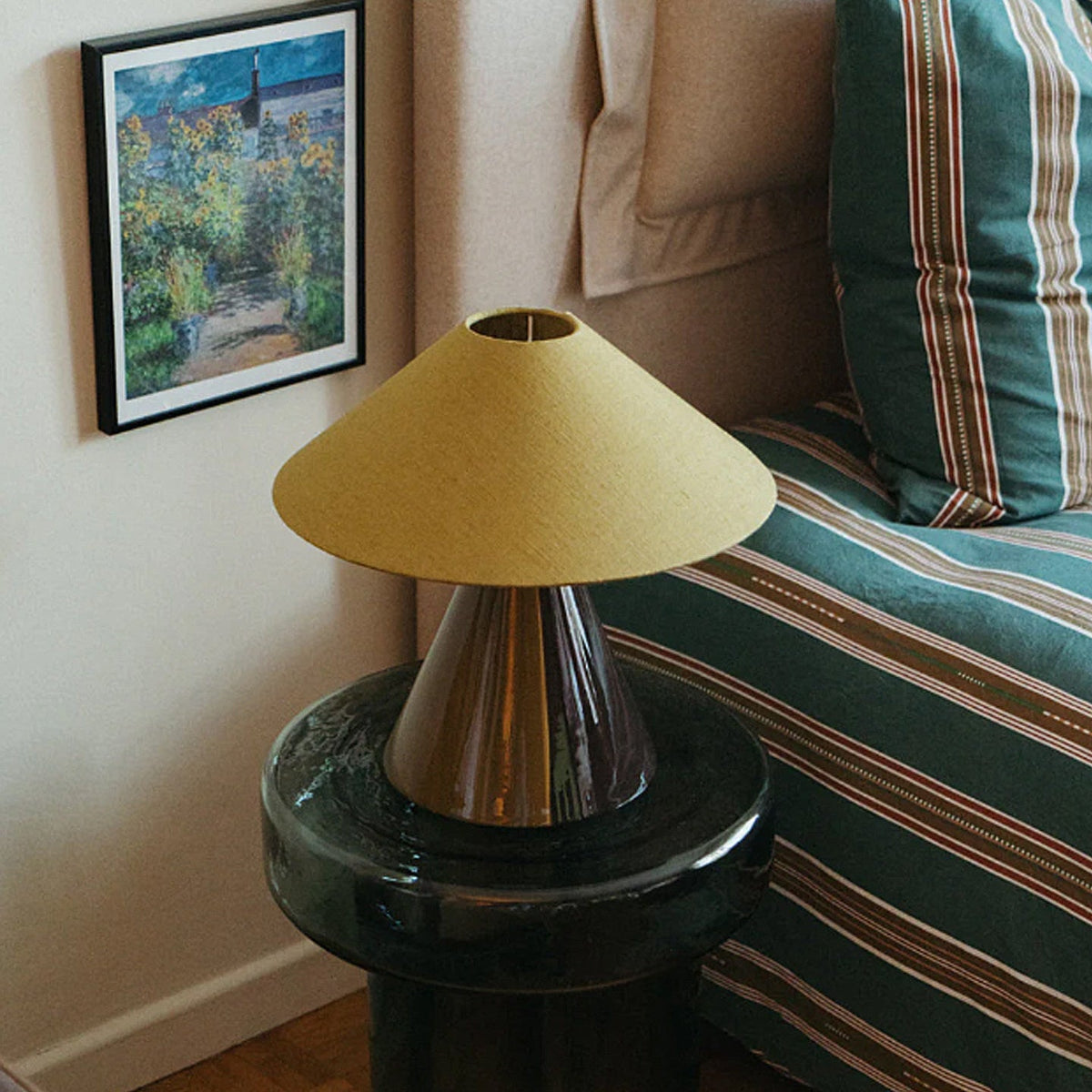 Sienvale Curated Iron & Glass Table Lamp warm illuminated room view