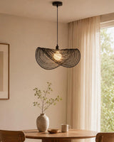 Sinuvera Curated Iron & Glass Pendant Light warm illuminated room view