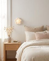 Star Alabaster Curated Alabaster Wall Sconce – illuminated warm ambiance setting