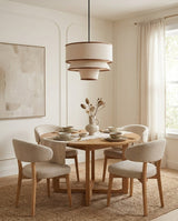 Tierova Curated Iron & Glass Pendant Light warm illuminated room view