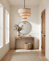 Tierova Curated Iron & Glass Pendant Light – illuminated warm ambiance setting