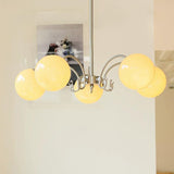 Valeria Curated Mouth-Blown Frosted Glass Chande installed in residential dining space