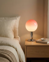 Veylan Curated Mouth-Blown Frosted Glass Table L – illuminated warm ambiance setting