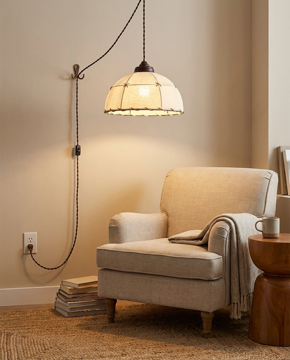 Dome Jari Curated Iron & Glass Pendant Light – illuminated warm ambiance setting