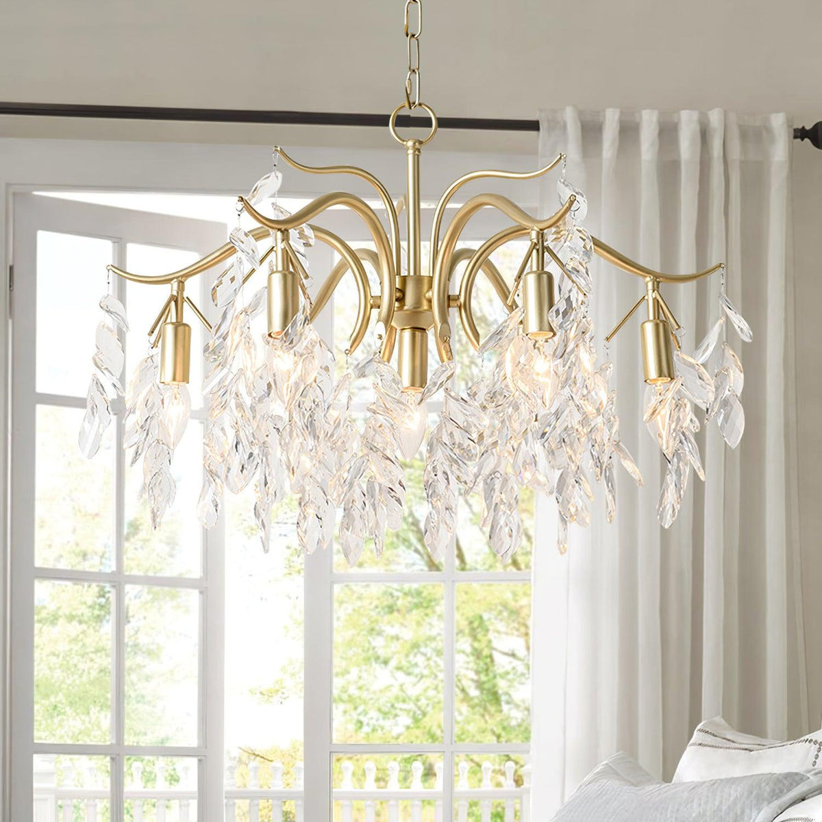 Dorale Curated Solid Brass Chandelier warm illuminated room view