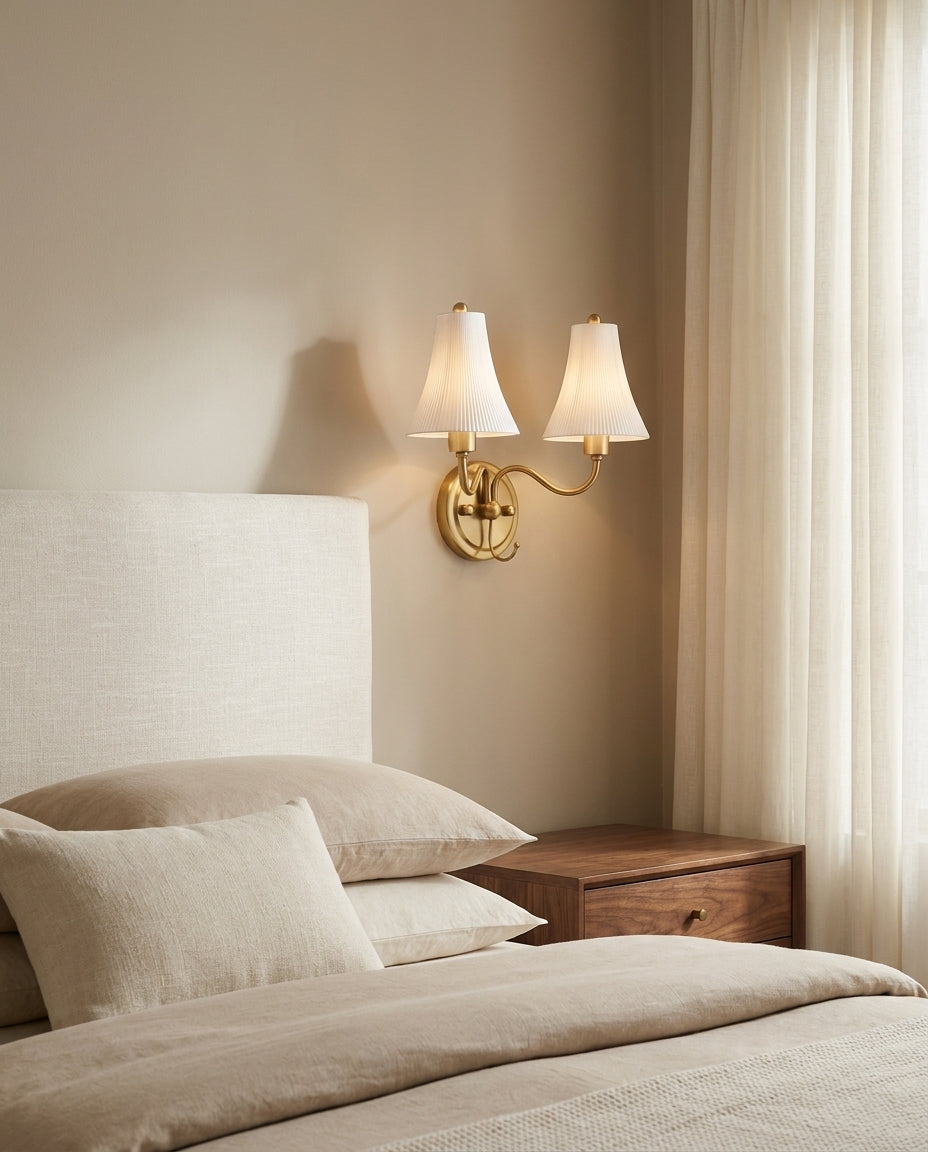 Dorienne Curated Solid Brass Wall Sconce installed in residential dining space