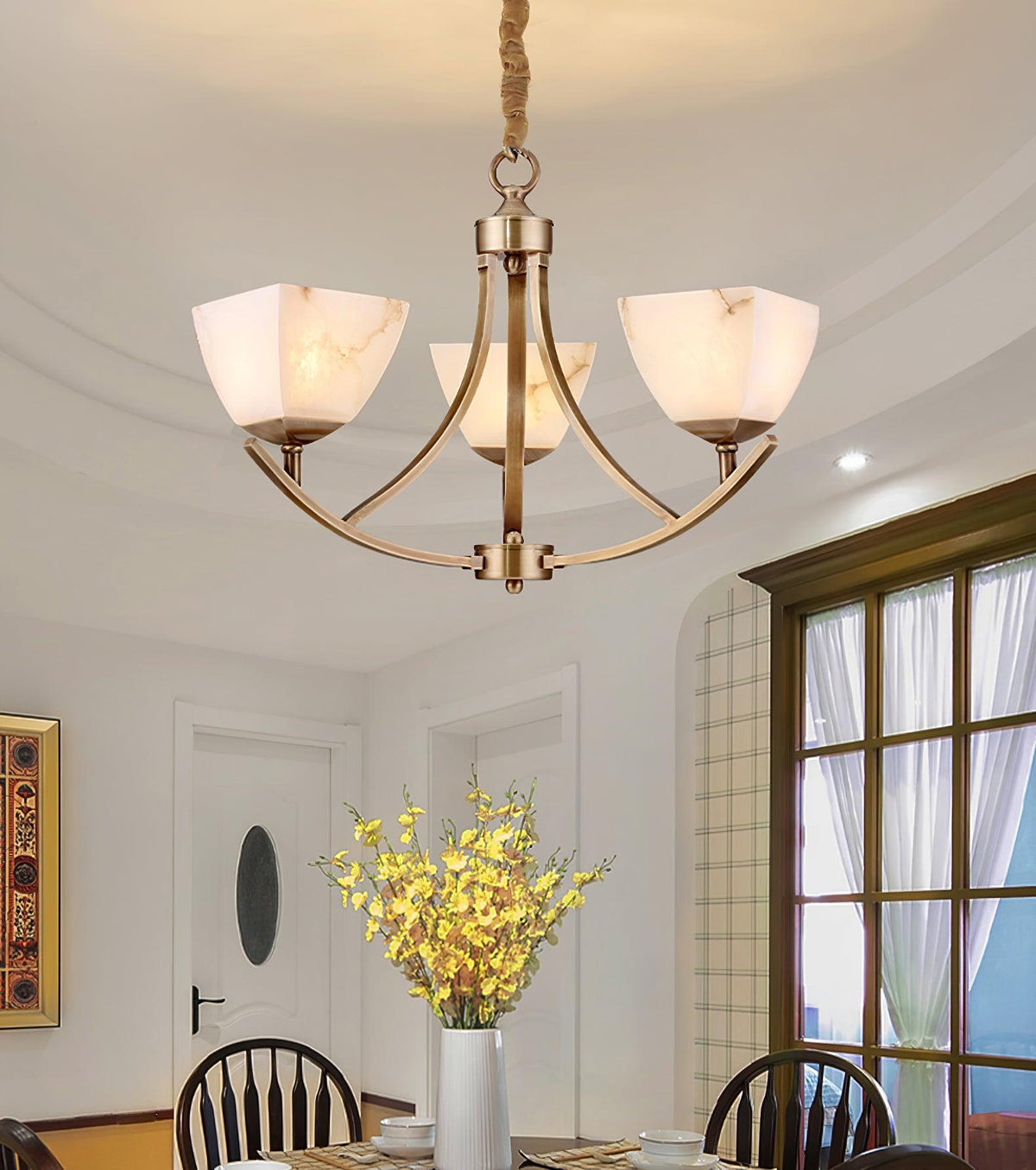 Dover Brass Curated Alabaster Chandelier – illuminated warm ambiance setting