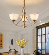 Dover Brass Curated Alabaster Chandelier – illuminated warm ambiance setting