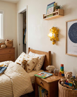 Dreamy Paws Curated Iron & Glass Wall Sconce – illuminated warm ambiance setting