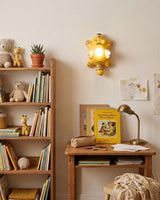 Dreamy Paws Curated Iron & Glass Wall Sconce warm illuminated room view