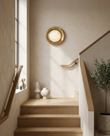 Dura Round Alabaster Curated Alabaster Wall Scon warm illuminated room view